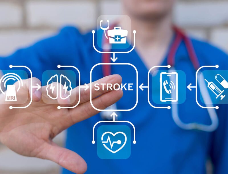 Cardiologist,working,on,virtual,touch,screen,presses,word:,stroke.,stroke