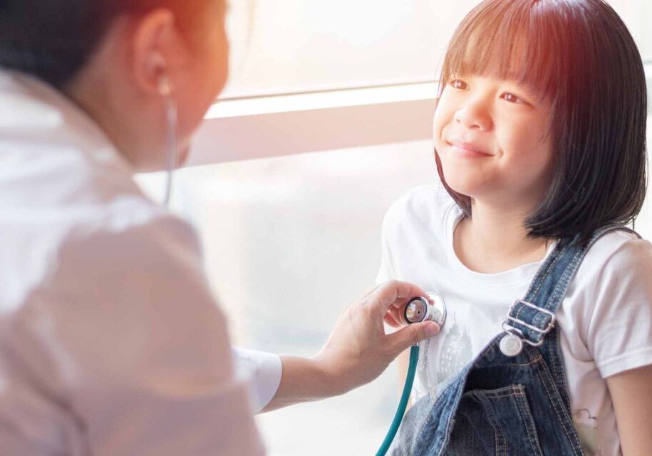 Professional,general,medical,pediatrician,doctor,in,white,uniform,gown,listen