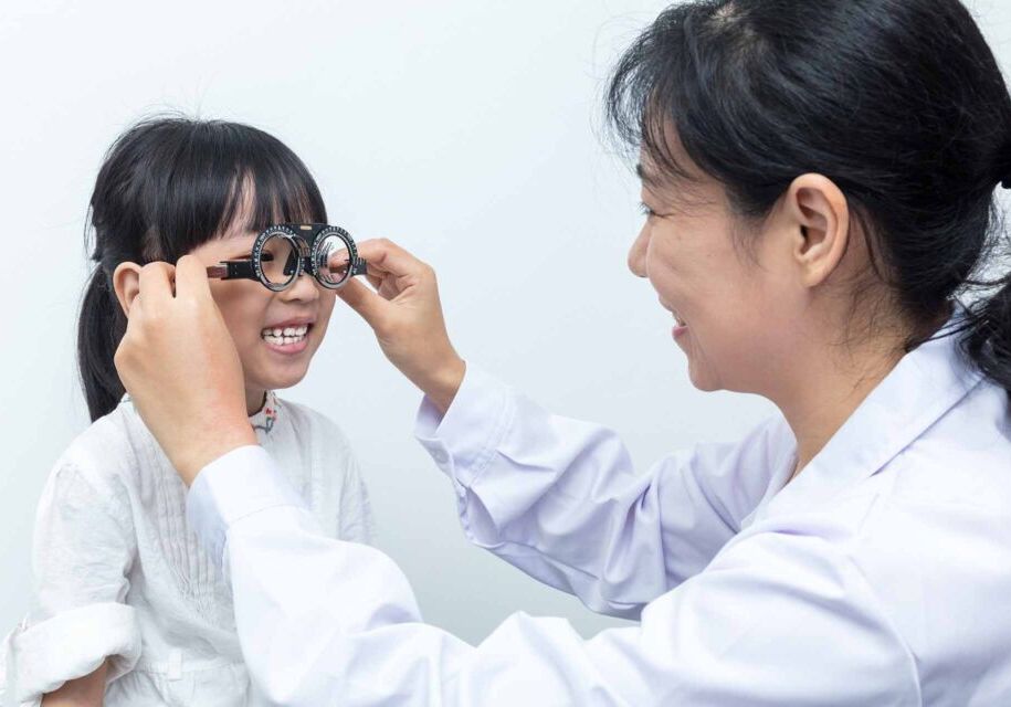 Asian,little,chinese,girl,doing,eyes,examination,by,ophthalmologist,in